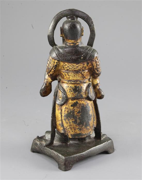 A Chinese gilt-lacquered bronze standing figure of the heavenly king, Duo Wen, late Ming, early 17th century, 24cm, lacking parasol to